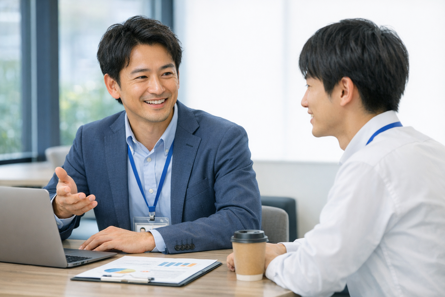 Japanese Businessman Discussing with Associate